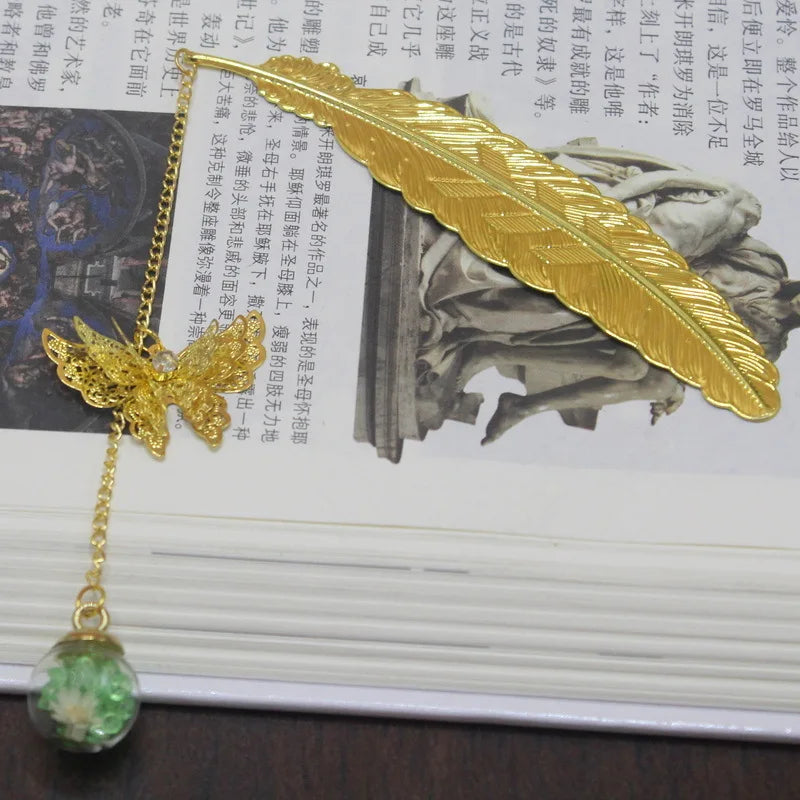 WhisperLeaf Metal Bookmark – Feather Design with Delicate Butterfly Charms