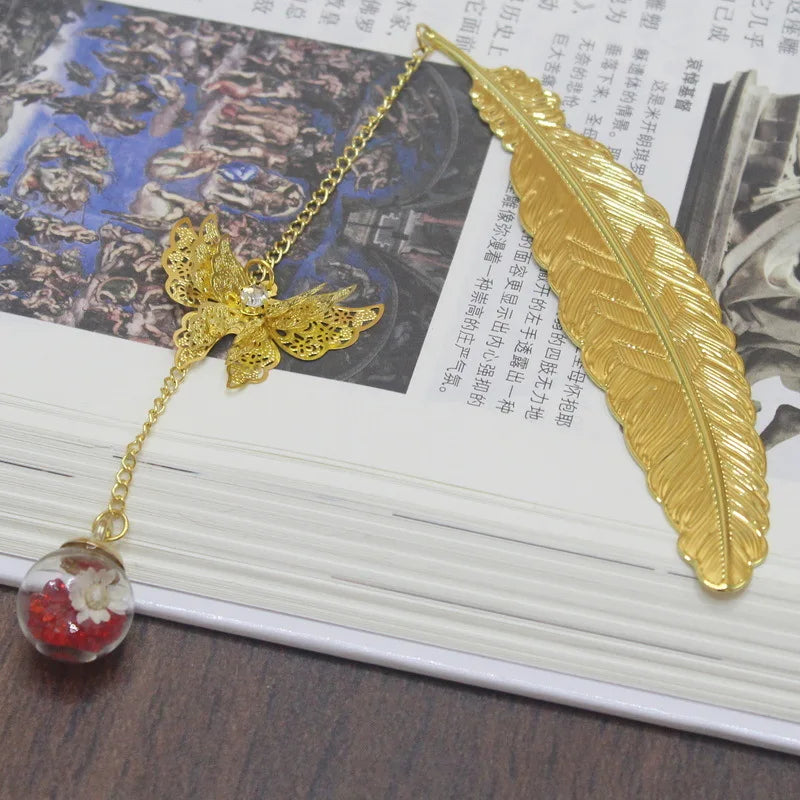 WhisperLeaf Metal Bookmark – Feather Design with Delicate Butterfly Charms